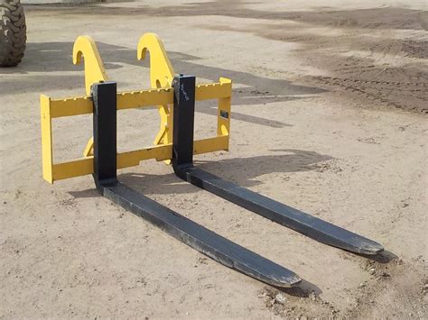 caterpillar skid steer fork oem|long forks for cat 930.